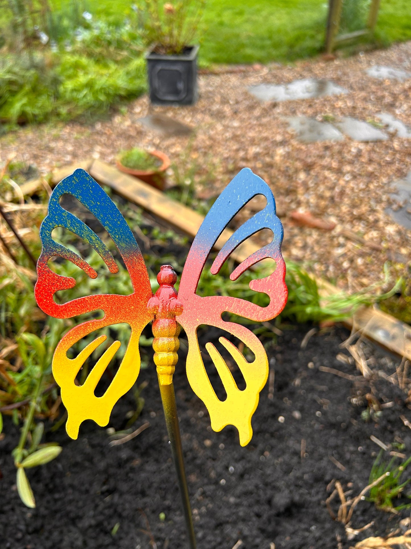 Butterfly garden ornament painted