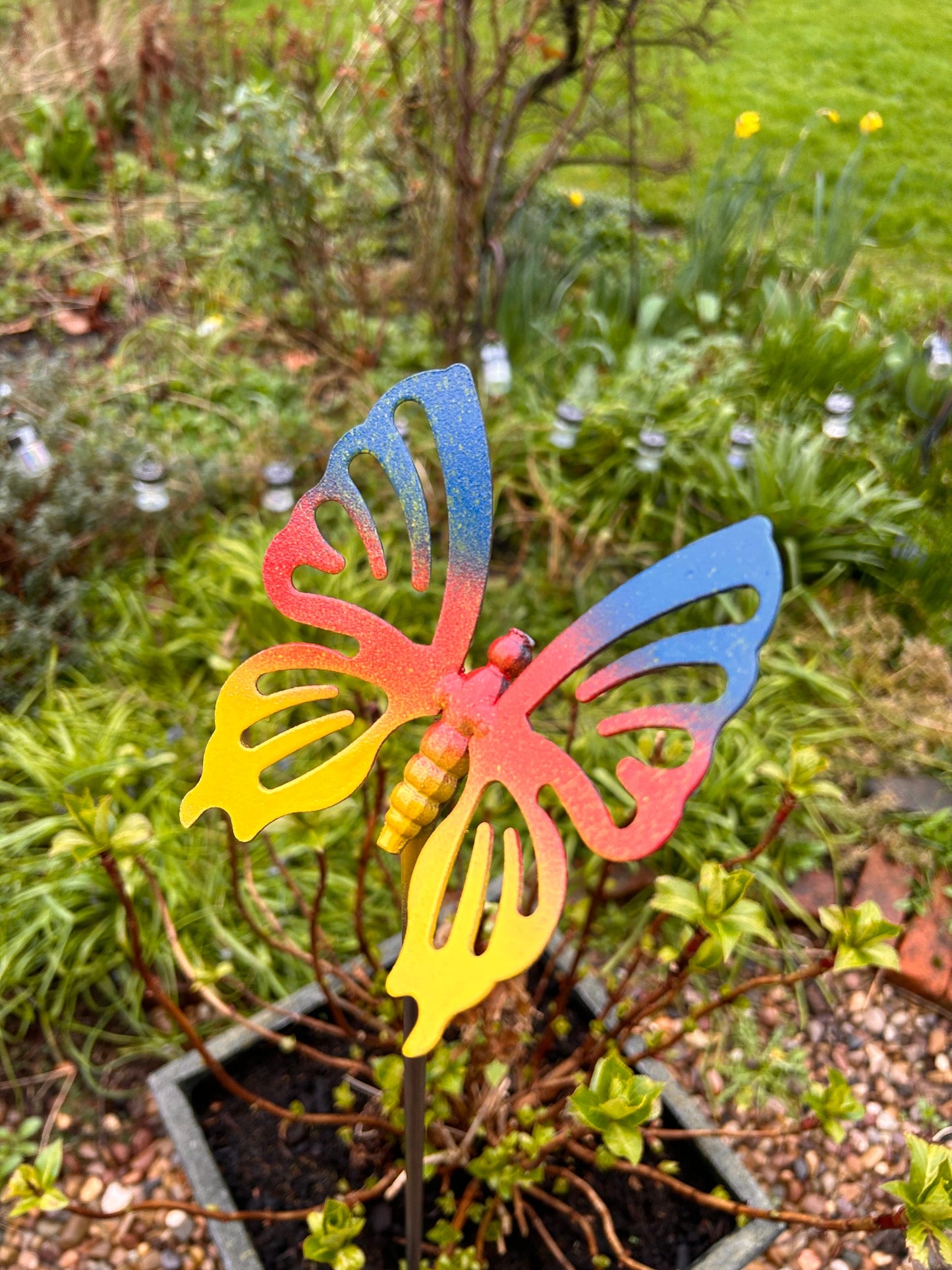 Butterfly garden ornament painted