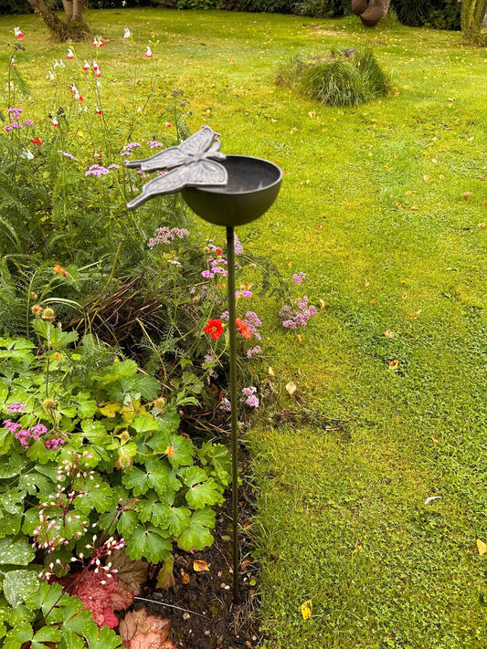 large steel butterfly mounted on steel cup on a 3ft steel stem